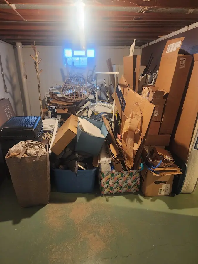 Roll-off dumpster container at job site for Yard Waste Dumpster Rental in Parma